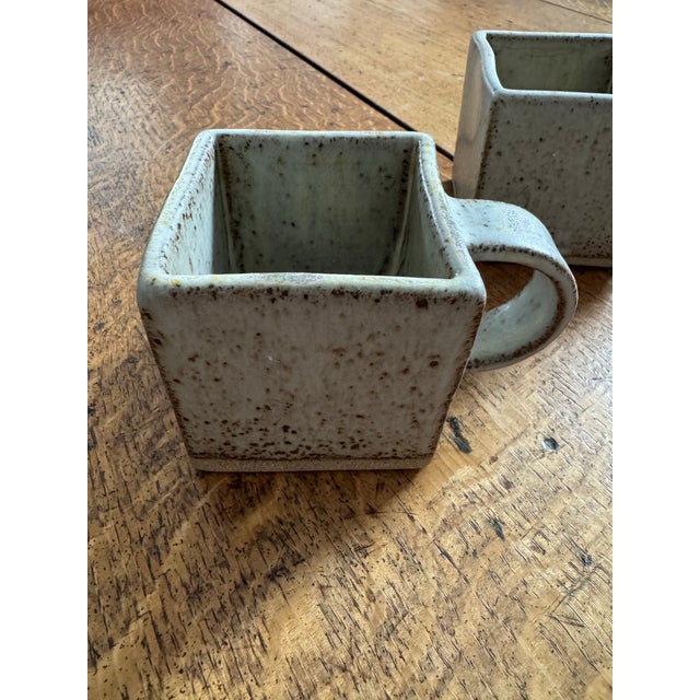 Set of 2 Tom Butcher Ceramics square stoneware mugs in sandy neutral