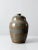 Vintage studio pottery jar showcasing a bold handcrafted form with a striking blue and brown glaze and beautifully tooled...