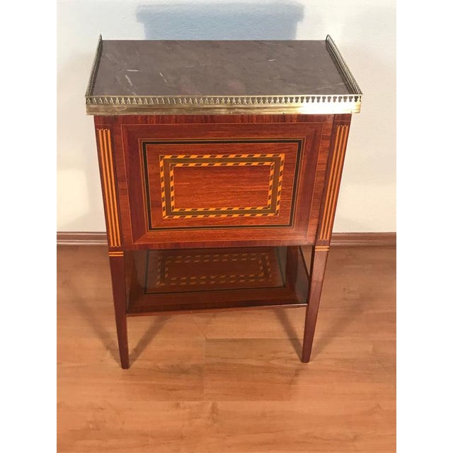 French louis xvi marquetry side table, paris, circa 1770 an elegant 18th-century french louis xvi side table, made in...