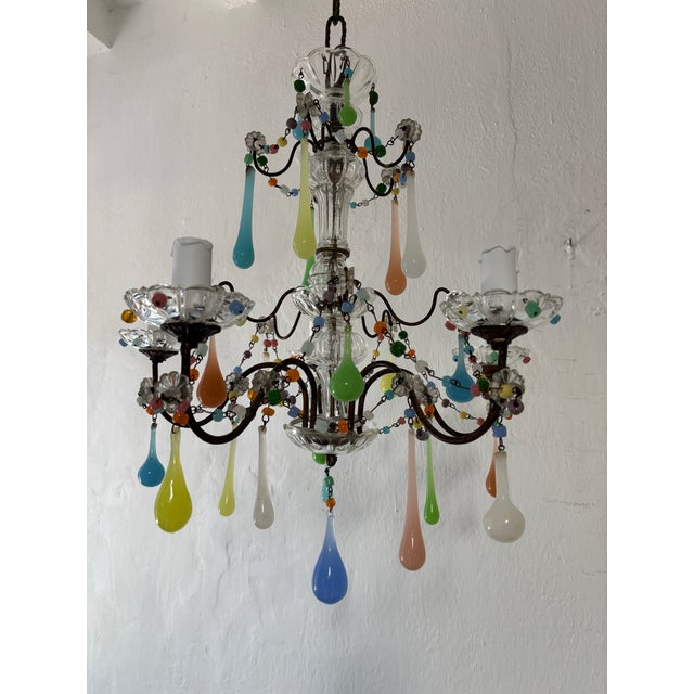 Housing 5 lights. This chandelier will be rewired with certified UL US sockets for the United States and appropriate...