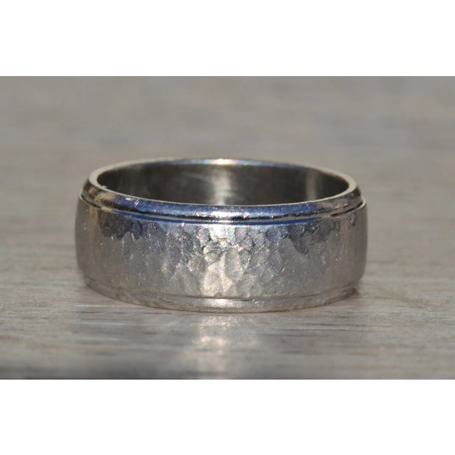 The Grayland: Gentlemen's Contemporary Hammered Platinum Wedding Band. Crafted in durable platinum, this contemporary...