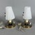 A refined pair of table lamps with a clean, mid-century feel, attributed to Italian manufacture in the 1960s. Design and...