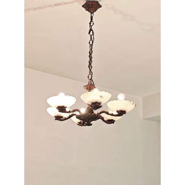 Vintage bronze and cream-colored alabaster chandelier with beautiful grain. Bronze frame and alabaster shades crafted in...