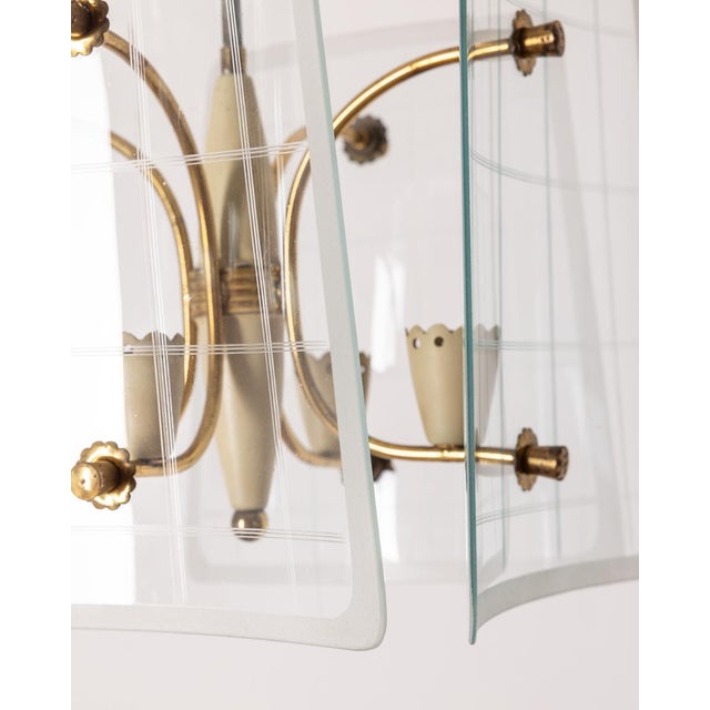 Chandelier with white metal and golden brass structure with decorated glass lampshades, Italian design, 1950s. Up to 250V...