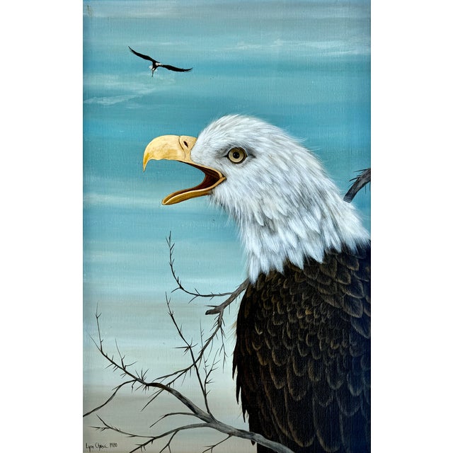 A commanding bald eagle, captured mid-call, with a second eagle soaring in the distance. This signed oil on canvas by Lynn...