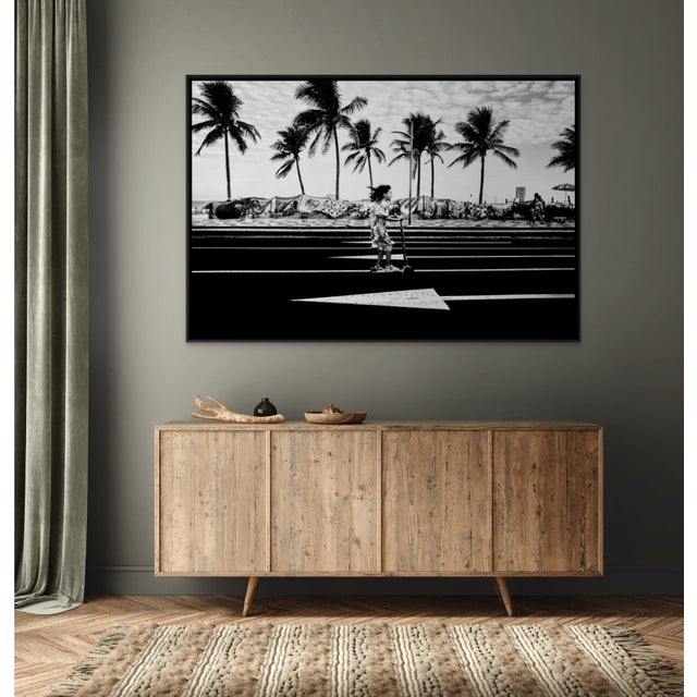 The freeing feeling of youthhood bundled into a singular moment: a young girl on a scooter cuts across Rio de Janeiro's...