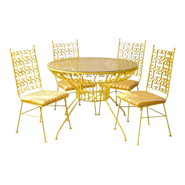 Mid 20th Century Styled After Arthur Umanoff Vintage Yellow Patio Dining Set With Glass Top Table and Four Chairs For Sale