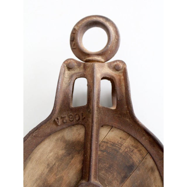 Antique early 20th-century Jamesway barn hay trolley pulley, associated with the James Manufacturing Co. of Fort Atkinson,...