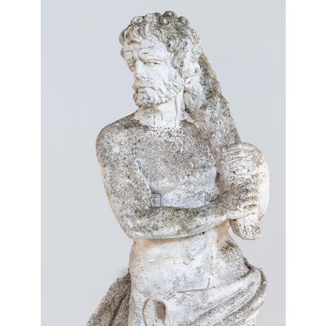 This French mid-20th C. limestone type composite stone garden figure of Hercules has a strong, classical presence,...