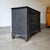 Dimensions: 54.25"W x 21"D x 36.25"H A beautifully timeworn English pine chest, finished in a rich ebonized and waxed...