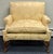 Elegant traditional accent chair upholstered in champagne-gold floral damask with a subtle sheen. Its distinctive shape...