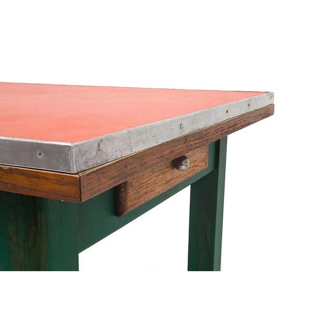 Oak table with extensions and drawer. Zinc strapping around the periphery. Length with extension: 190 cm Circa 1950