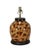 Table Lamps: The iconic tortoiseshell texture showcases swirling patterns of dark brown, caramel, and beige. The lamp body...