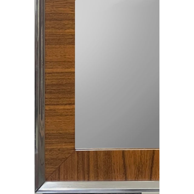 Vintage Modernist Mirrors in Chrome and Matched Grain Frames, Pair Offered for sale is a elegant pair of vintage Modernist...