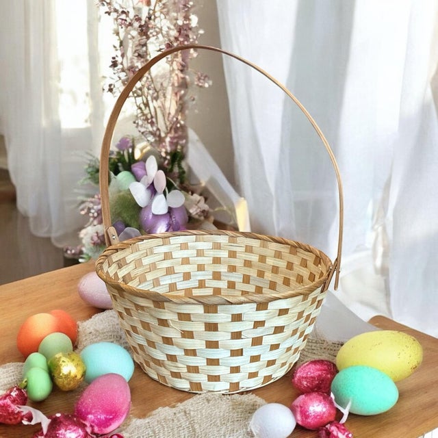 Lovely aesthetic with this contrasting weave of light and dark. Split reed organic basket with a hinged handle and wrapped...