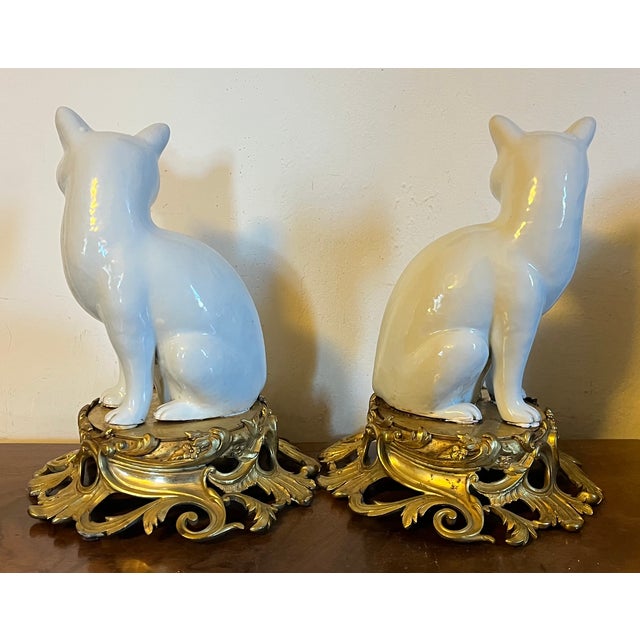 White Antique 19th Century Japanese Blanc De Chine Models of Seated Cats Mounted on French Gilt Bronze Ormolu Bases - A Pair For Sale - Image 8 of 12