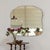 Beautiful vintage mirror from France, 1930s. Lovely wavy beveled mirror secured to a wooden back. Original mirror shows...