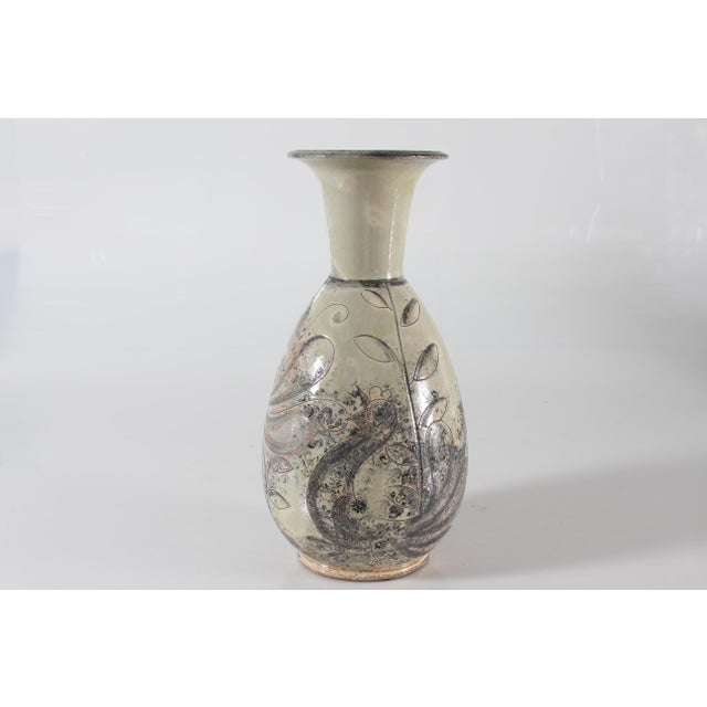 Large ceramic vase by Jens Thirslund made at Herman A. Kählers ceramic workshop 1925-1930. The glaze is greenish eggshell...
