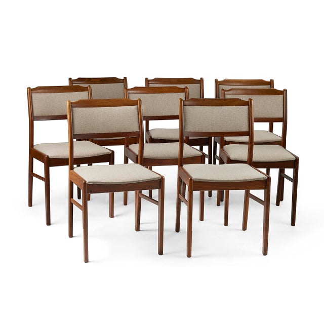 This elegant vintage Danish Mid-Century Modern dining chair featuring a beautifully sculpted wood frame with gently curved...