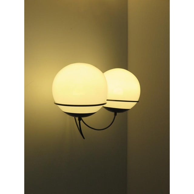 Wall lamp applique composed of two white opal glass speakers and produced by Candle, burnished metal structure, Italy 60s...