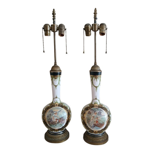 Exquisite, rare antique French Opaline Hand Painted and Gilt Table Lamp set. Each lamp has a different scene: one of an...