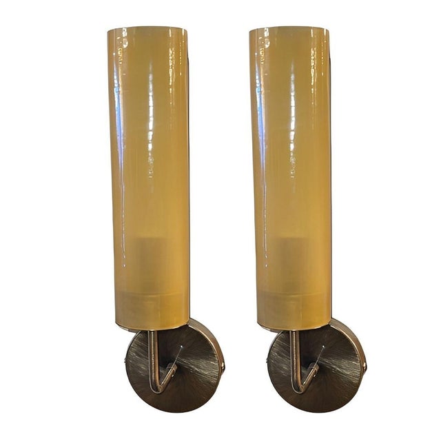 A striking Set of Six Italian sconces/wall lights from the 1970's, featuring vintage amber Murano glass tubes elegantly...