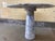 This beautiful vintage dining table in solid marble features a striking and sculptural design, with an elegant conical...