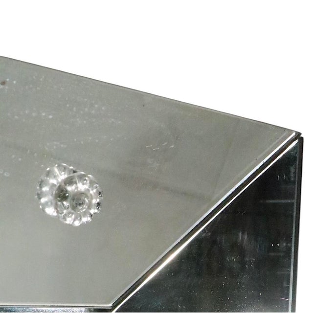 Chic mirror framed mirror, in the Art Deco, Hollywood Regency, Mid Century Modern style, circa 1950/60's. The mirror...