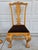 Queen Anne-style wooden dining chairs with ball-and-claw feet and dark brown upholstered seats. This set is in good...