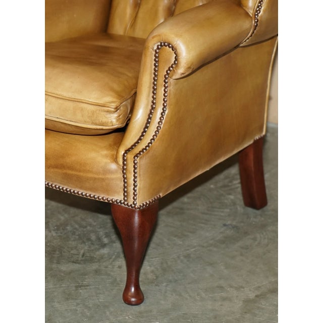 Animal Skin Pair of Vintage Tan Brown Leather Chesterfield Wingback Chairs With Footstools For Sale - Image 7 of 18
