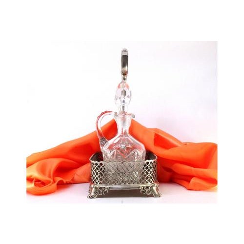 Cruet Set with Silver Structure and Cut Glass Cruets, Set of 3, in Very Good conditions. Designed 1920 to 1949 This piece...