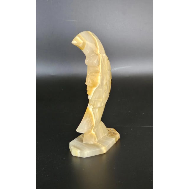 Man In The Moon earthy tones solid onyx figurine manufactured with a coarse bottom. 6" H x 2" W x 4" L 12.9 oz