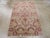 This early 20th century Persian Lavar Kerman rug, measuring 3' 0" x 4' 10", features a finely drawn allover medallion-and-...