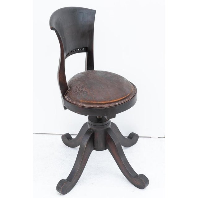 Rare Office chair, Made in Italy, early 1900s. The frame of this chair is stained beech while the seat is ORIGINAL cracchè...