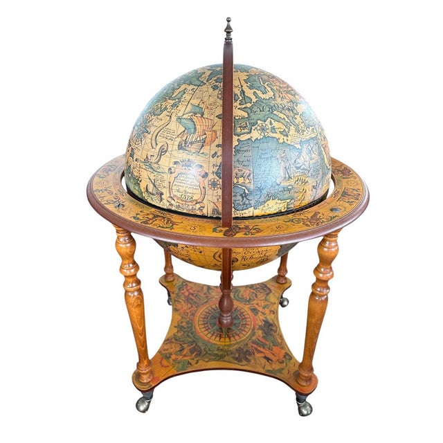 Vintage bar globe. Designed in the mid-20th century, this bar globe combines artistry and practicality, featuring a...