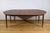 This Scandinavian teak dining table from the 1970s is a perfect example of clean, functional design. with its four spindle...