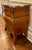 An exquisite Louis XV style bombé chest featuring exceptional craftsmanship and classic Rococo lines. The commode is...