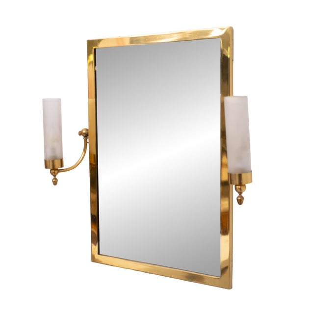 Stunning Wall Mirror with attached lighting , Brass frame ,comes with Two adjustable lamps ,with cylinder shaped frosted...