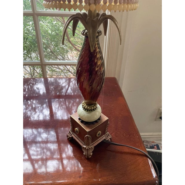 Unique artistic multi media table lamp crafted with glass, metal and fabric. Circa 1990s.
