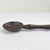 The Luba wood spoon was hand-carved by the Luba people of the Democratic Republic of the Congo. This spoon illustrates a...