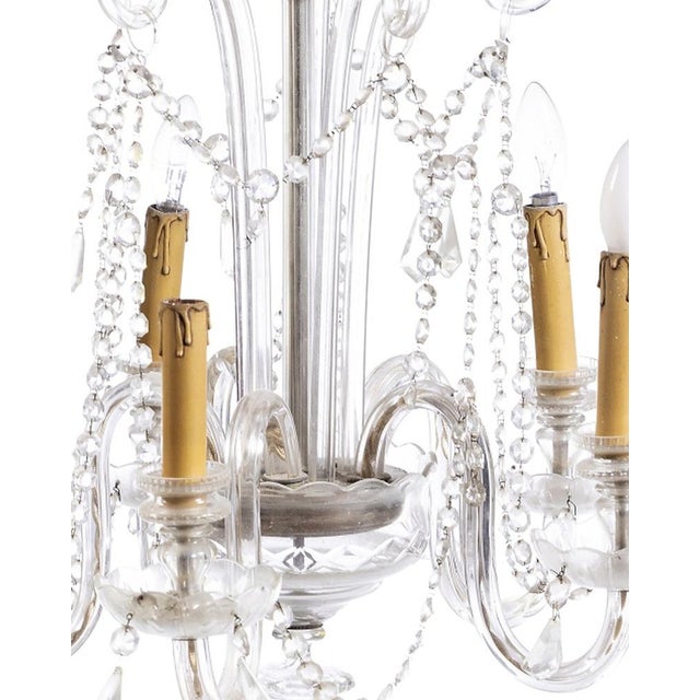 Lighting - Chandelier. 20th-century Portuguese style; made of glass with crystal pendants. Minor defects. Dimensions:...