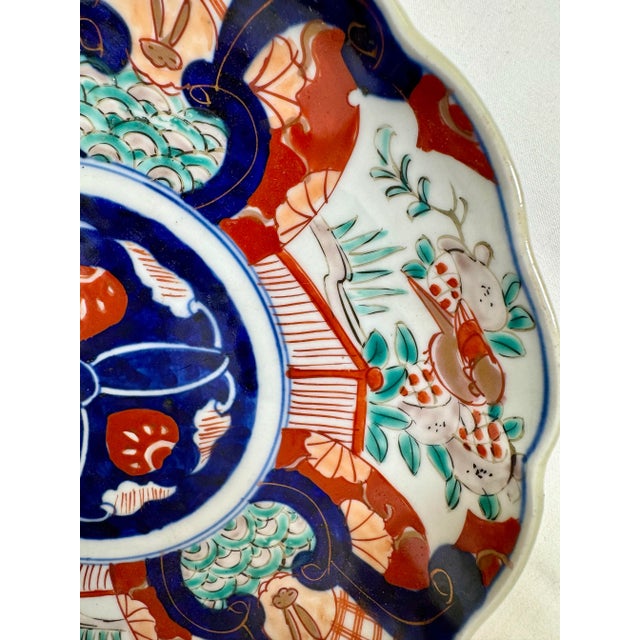 Imari Porcelain Vintage Scalloped Edge Imari Plate Decorated With Colorful Birds & Rabbits From Japan - Circa 1940 For Sale - Image 4 of 12