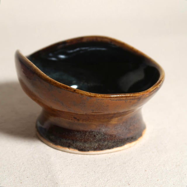 Hand-Thrown Studio Ceramic Bowl With Undulating Rim Earthy Brown and Blue Glaze on Pedestal Foot For Sale - Image 11 of 13