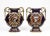 A rare pair of cobalt blue porcelain and Limoges enamel portrait vases. France, late 19th century. Elaborately gilded to a...