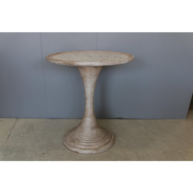 Gloria Table by Gabby. The eye-catching Gloria Table features a grooved hour glass shape and an antique gold and silver...