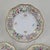 Set of three Schumann Germany Chateau Dresden Flowers reticulated porcelain saucers. These elegant pieces feature...