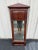 A stunning 19th century mahogany mirror in a neoclassical empire style. Tall and slender with a stout frame, this mirror...
