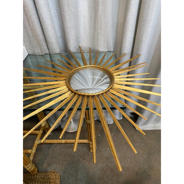 Vintage gilt metal convex mirror sunburst style.