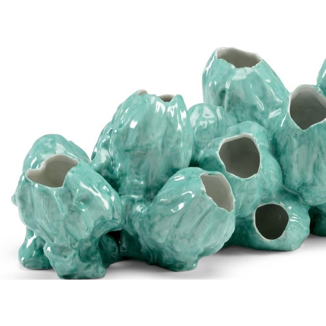 Add a burst of color to your coastal decor with our green glazed porcelain barnacles. This nature inspired accent is ideal...