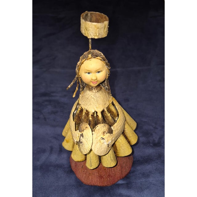 This is a vintage folk art tin angel tree topper, handcrafted with a rustic, primitive charm. Key Visual Features...